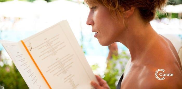 A lady perusing a restaurant menu