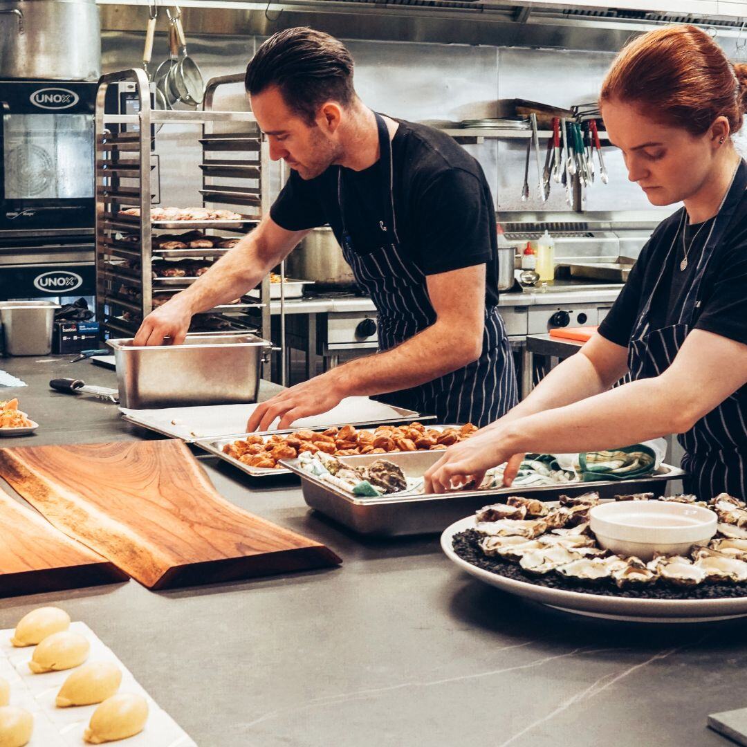 catering employees preparing food catering employees preparing food